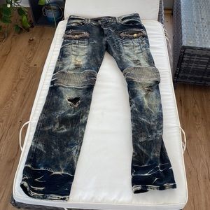 Robin’s Jean distressed stud Moto jeans